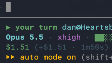 Close crop of Claude Code's status bar in a terminal: it's my turn, the model is Opus 5.5 at extra-high effort, this session has cost $1.51, and auto mode is on.